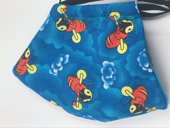 Kiwiana Buzzy Bee with White Polka Dots on Turquoise on Reverse Side - Reversible Limited Edition Face Mask image 2